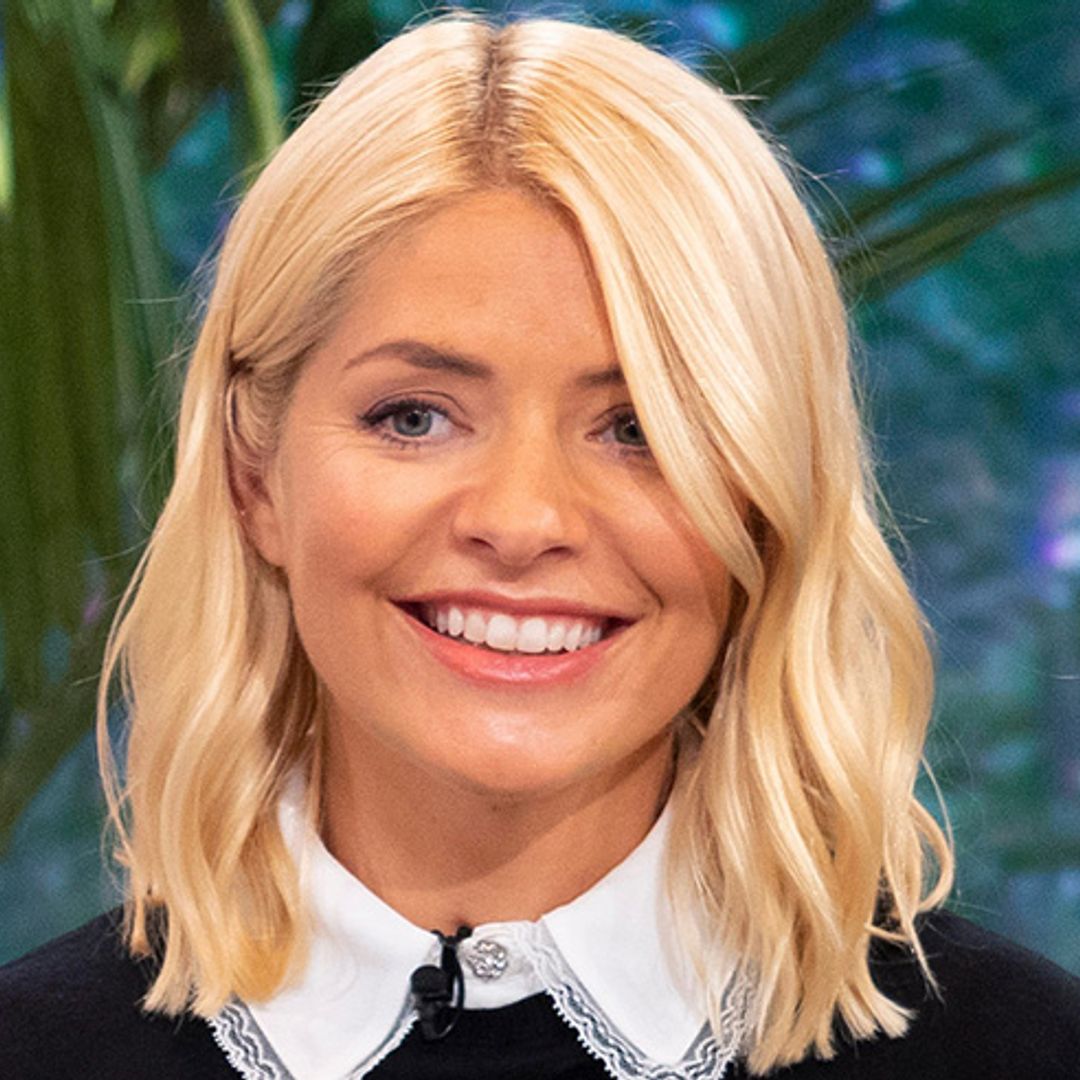 Holly Willoughby embraces her inner cowgirl in double denim outfit – and her boots are to die for!