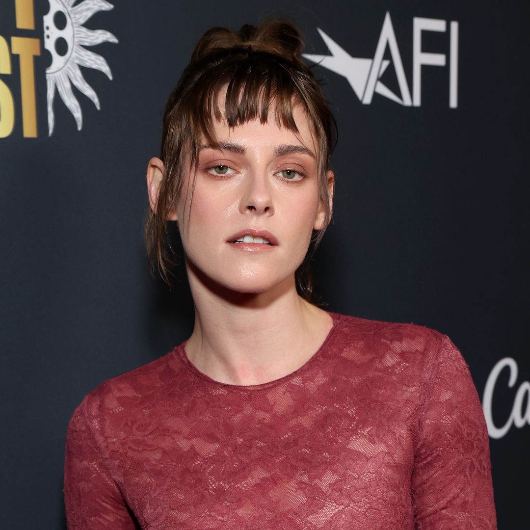 Kristen Stewart puts a gothic spin on the naked dress in sheer oxblood lace