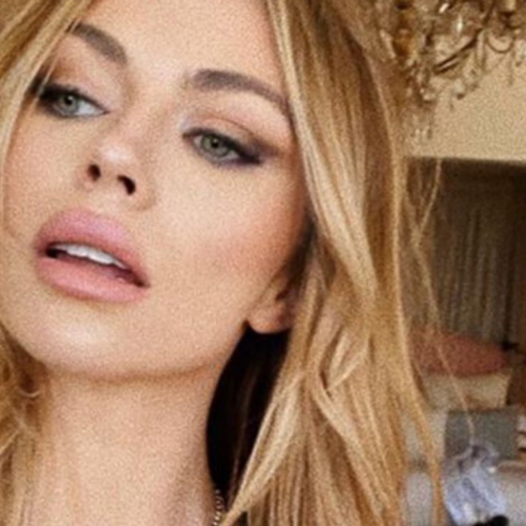 Abbey Clancy stuns in wedding dress as she marks anniversary