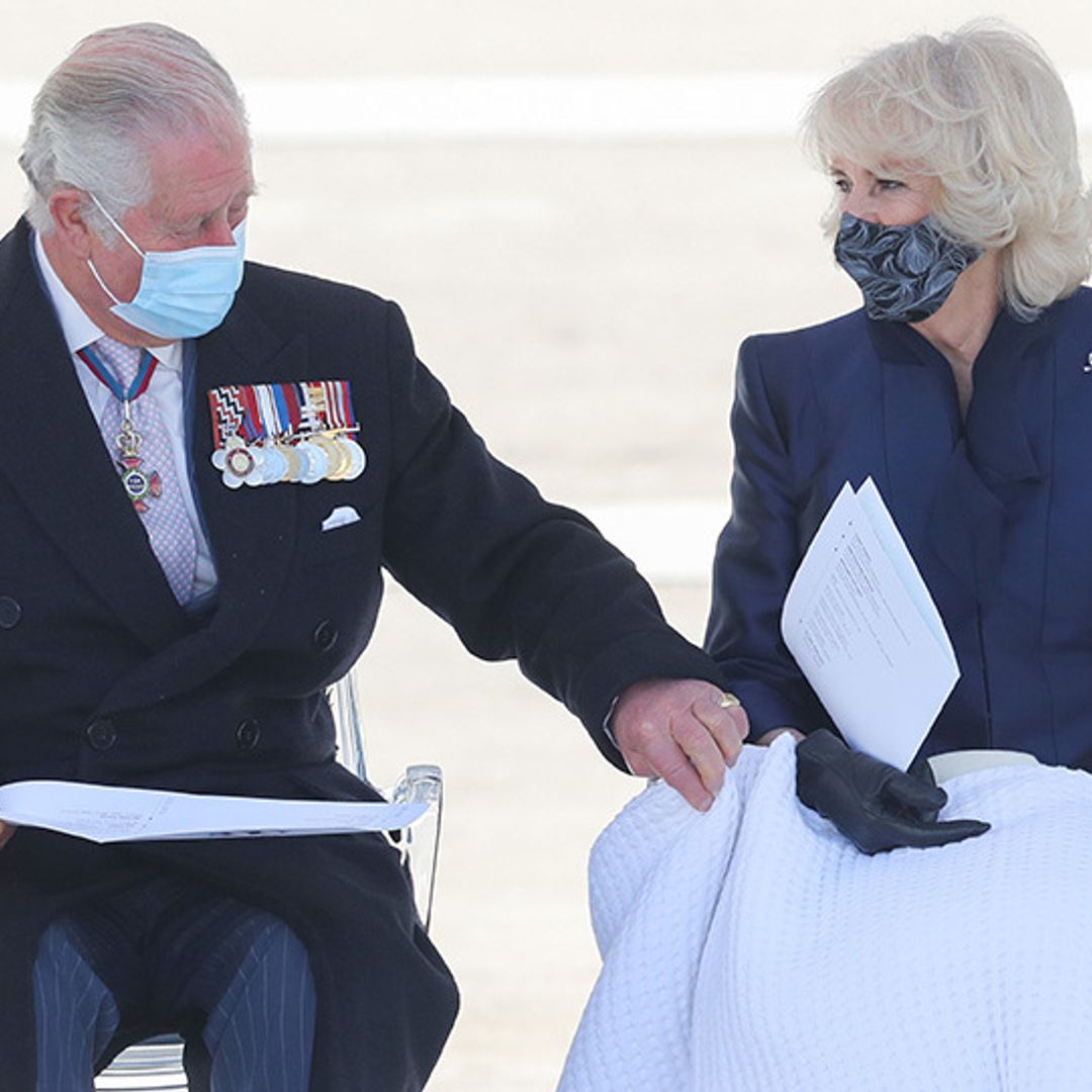 Prince Charles sweetly helps Duchess Camilla put a blanket on her lap during royal tour of Greece