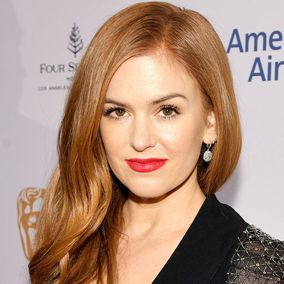 Isla Fisher floors fans in chic gold mini dress in jaw-dropping new appearance