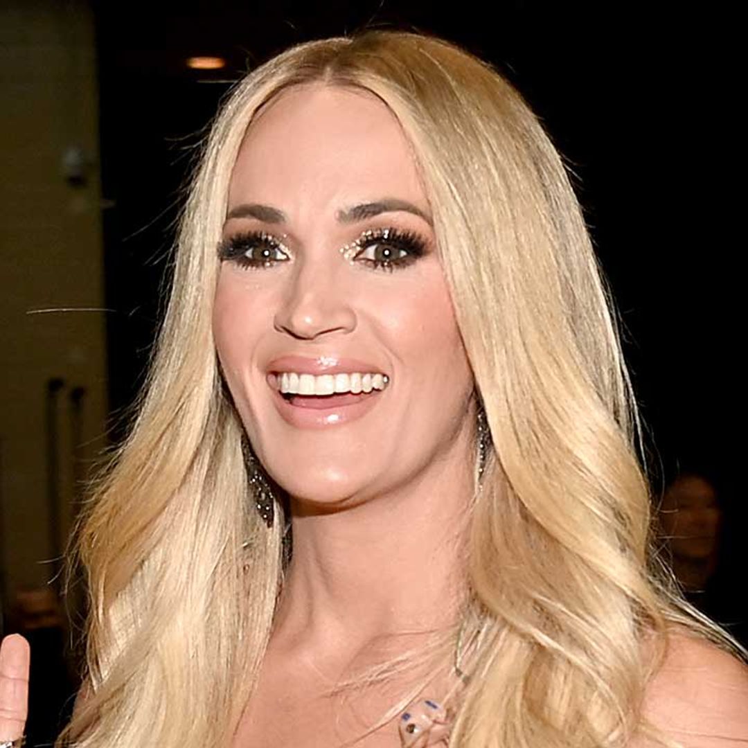 Carrie Underwood celebrates joyous news in dazzling sheer dress