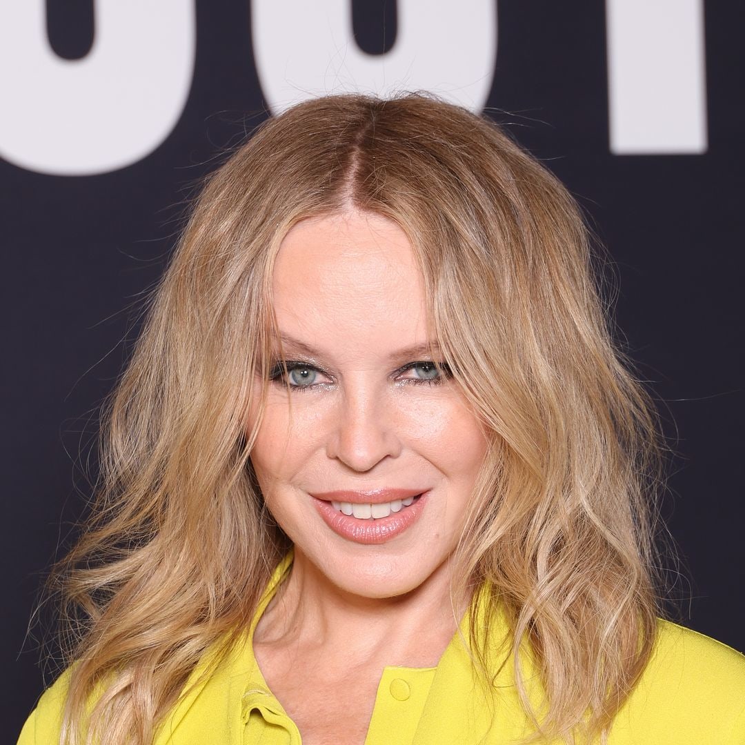 Kylie Minogue looks ageless in ripped jeans and towering heels - and wow