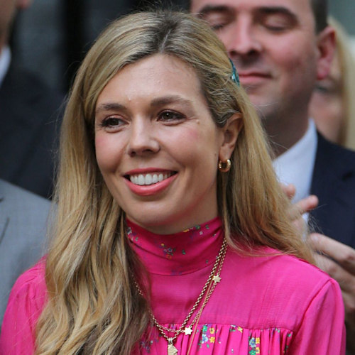 Carrie Johnson surprises with bare baby bump photo