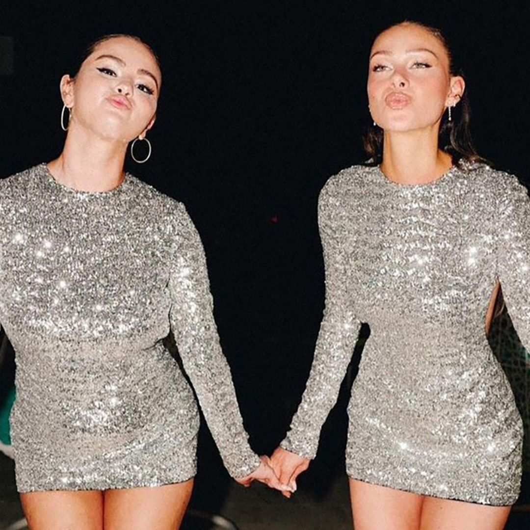 Selena Gomez and Nicola Peltz twin in silver sequin Valentino mini dresses