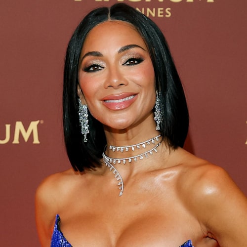 Nicole Scherzinger shows off her toned physique in tiny crop top