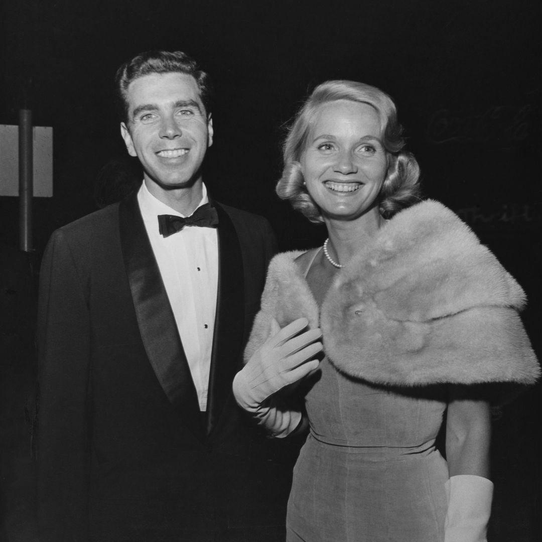 American television director Jeffrey Hayden (1926-2016), wearing a tuxedo and bow tie. and his wife, American actress Eva Marie Saint, wearing a fur evening wrap over her dress, with white evening gloves, attend the premiere of 'The Big Country, ' venue, Los Angeles, California, 1st October 1958. (Photo by Darlene Hammond/Pictorial Parade/Archive Photos/Getty Images)