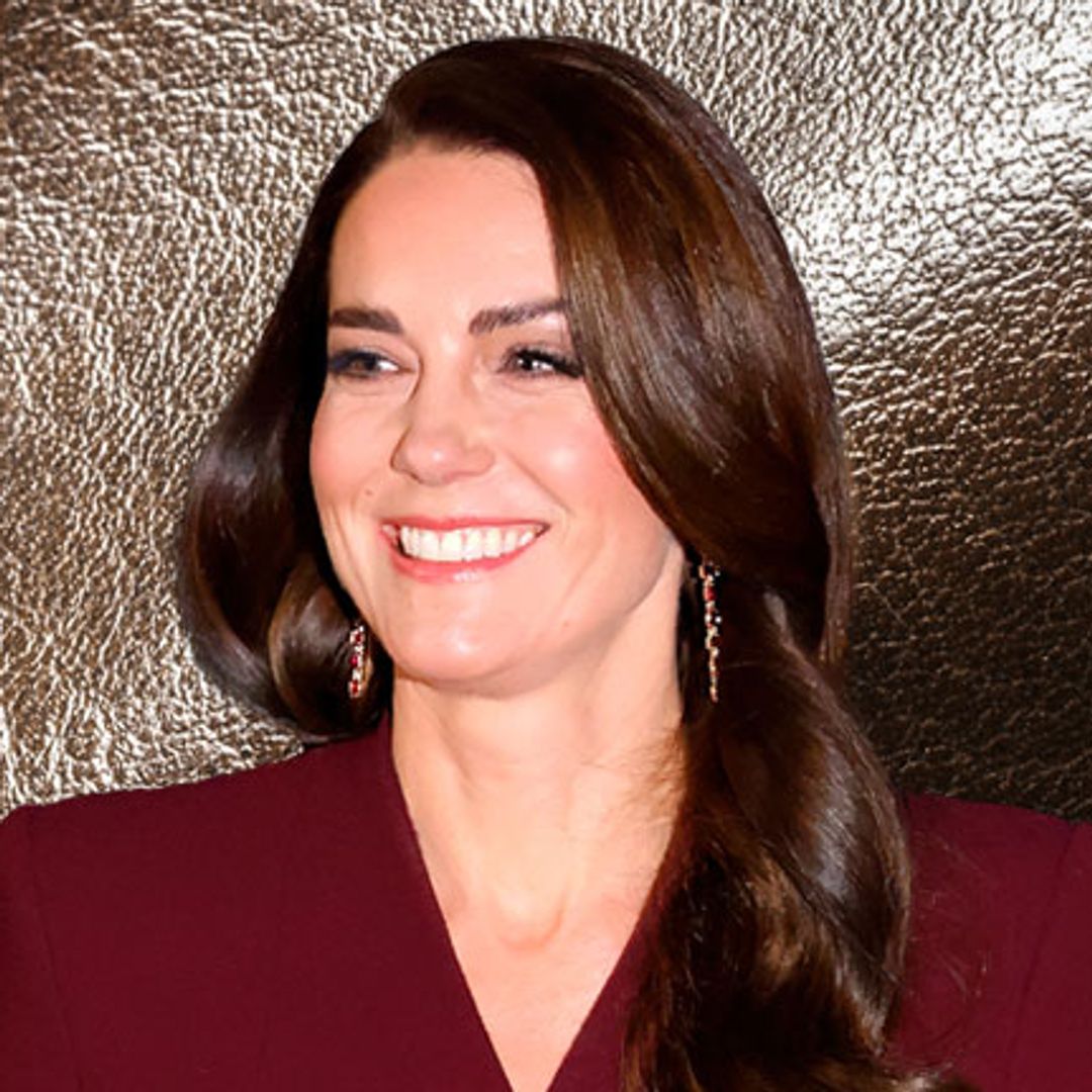 Kate Middleton exudes festive glamour in statement bow dress at ...