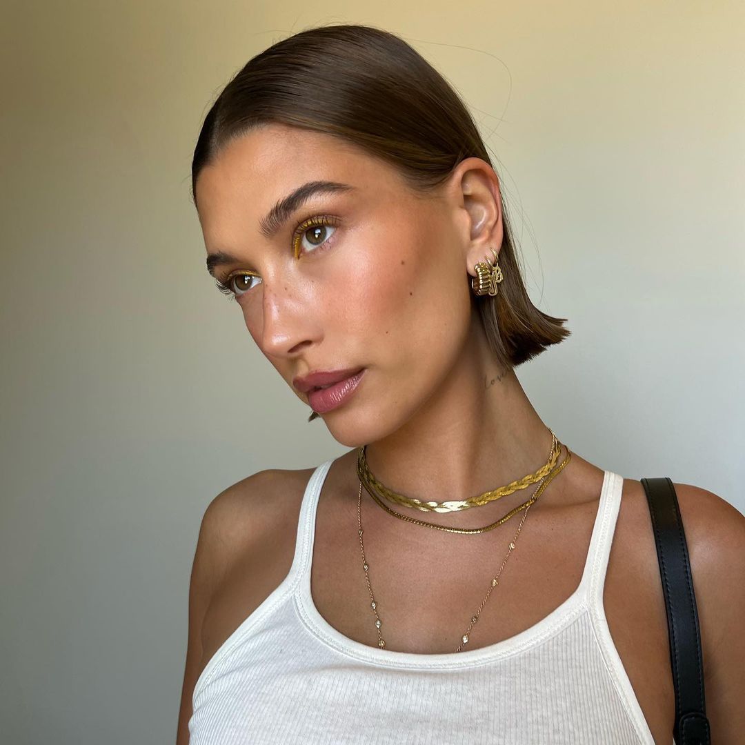 Hailey Bieber’s affordable yellow sandals are the comfy shoe we need for summer