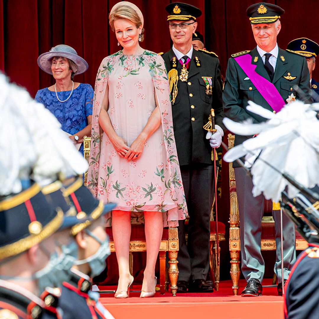 Queen Mathilde is overcome with emotion as Princess Elisabeth takes part in first military parade
