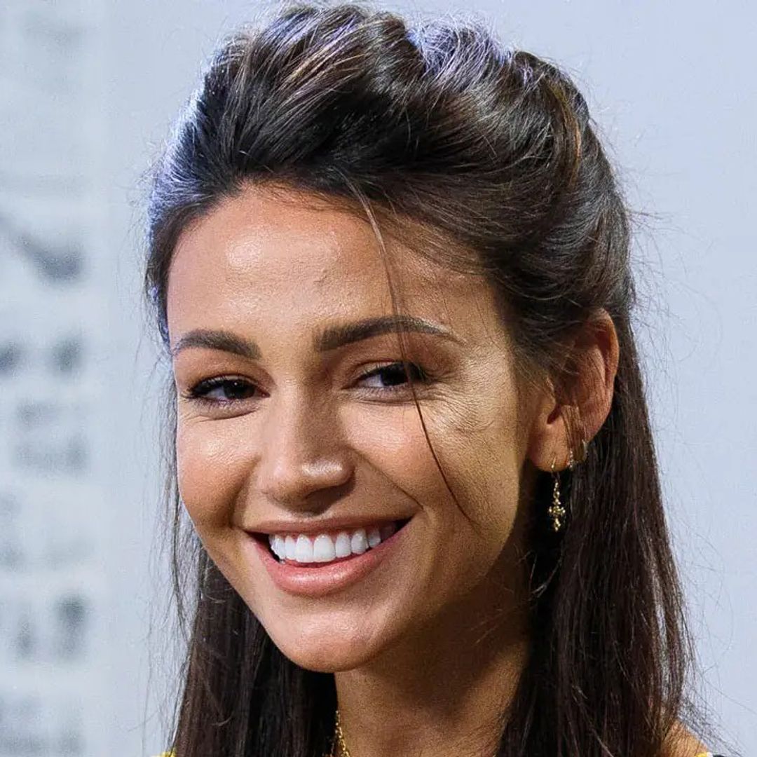 Michelle Keegan glams up a grey day with cosy coat and statement earrings