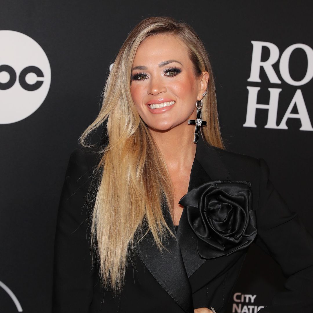 Carrie Underwood displays insanely toned legs in micro mini dress in gorgeous new photos