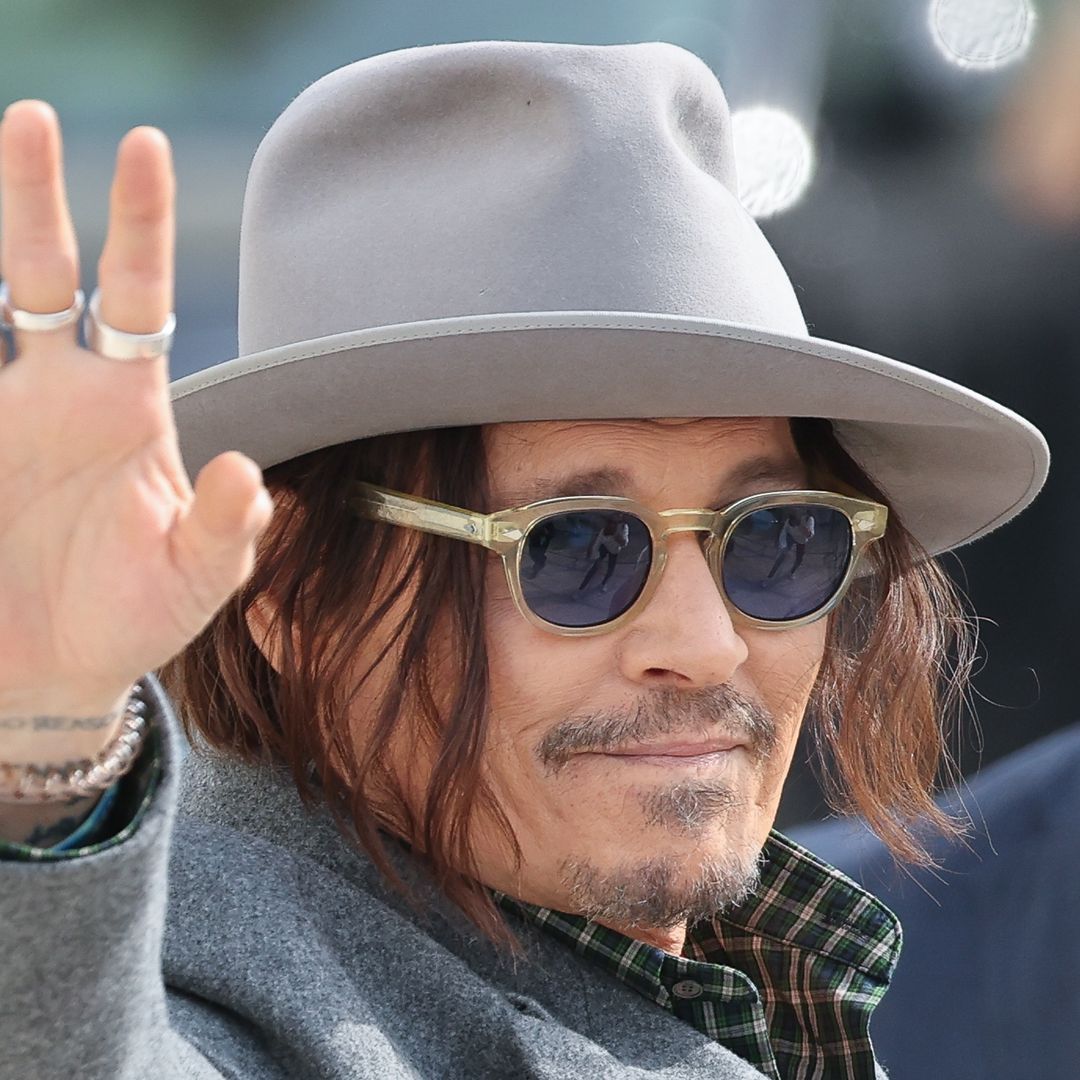 Johnny Depp is all smiles a year after an incredible teeth transformation