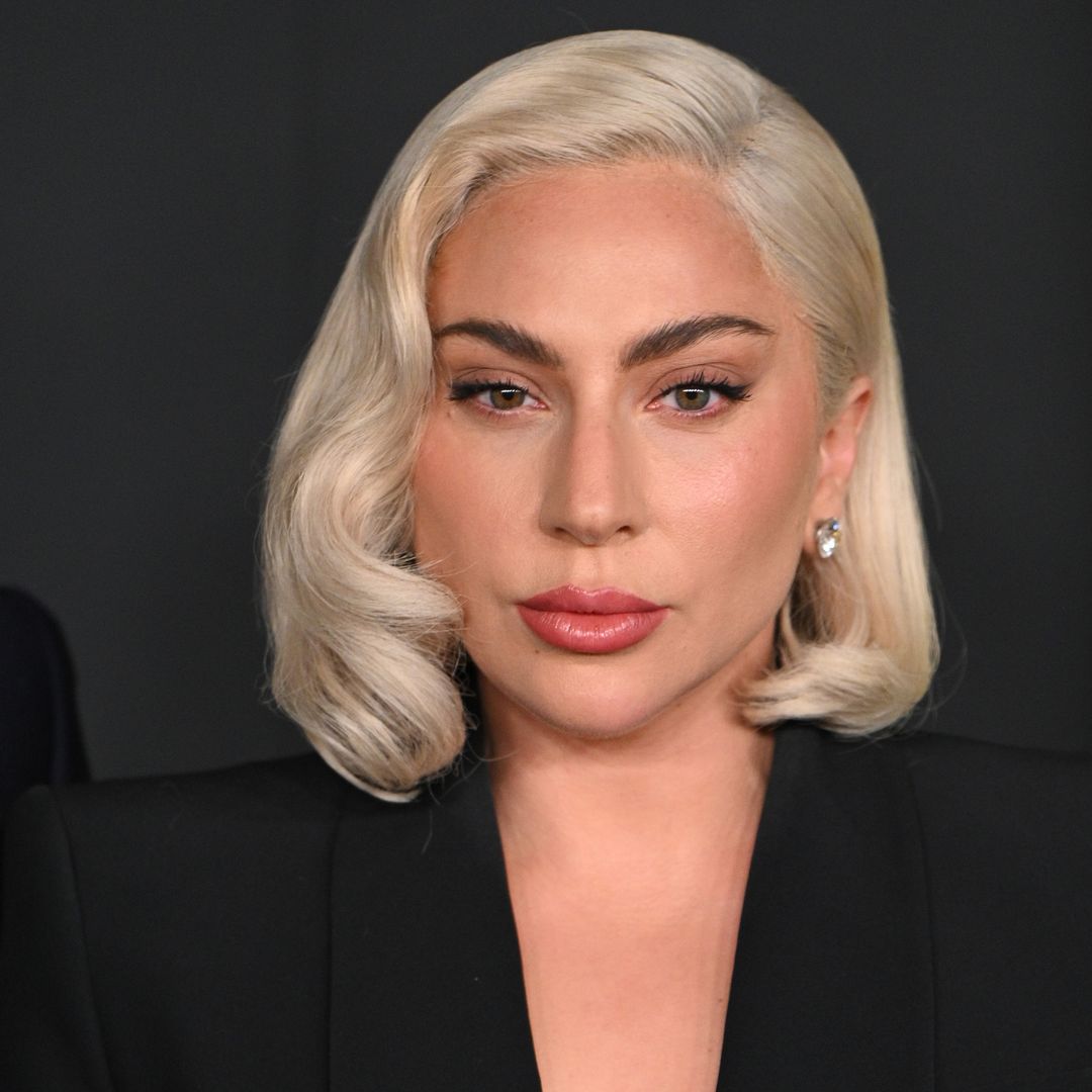 Lady Gaga is all legs in new photos as she drives fans wild with look inside her crowded studio
