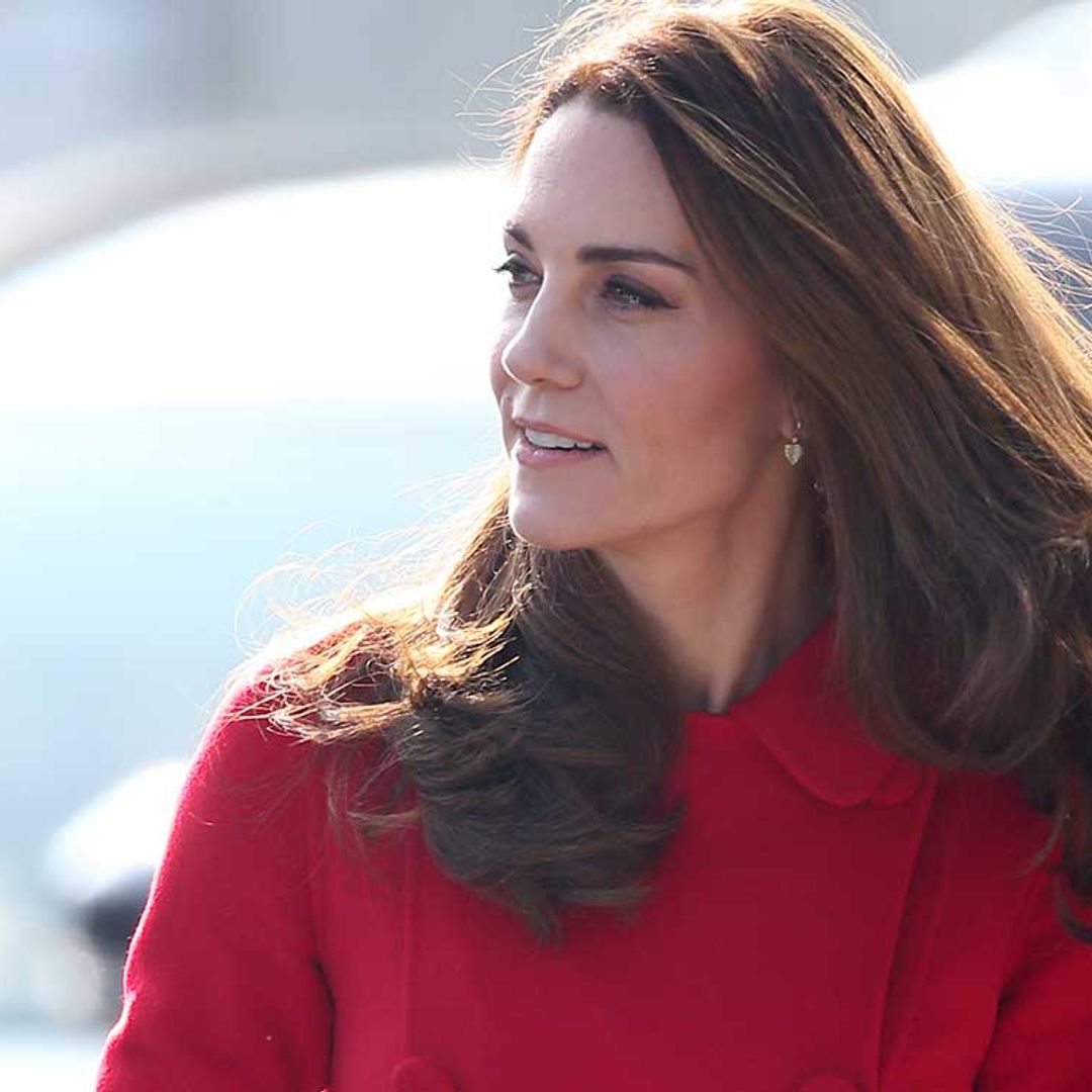 Outfit change! Kate Middleton switches her red coat for something totally different while on a visit to Northern Ireland