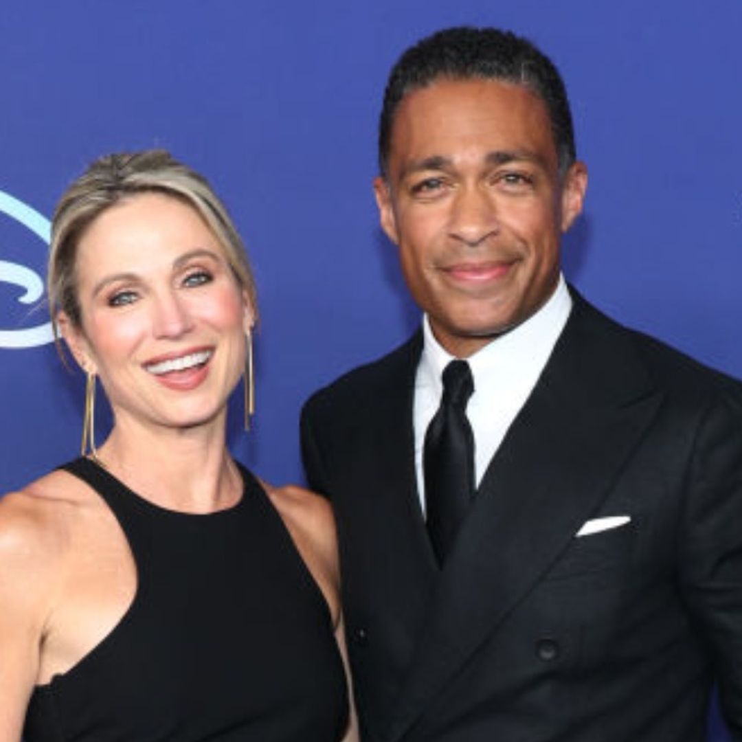 Amy Robach and T.J. Holmes enjoy steamy public kiss as they struggle to keep their hands to themselves
