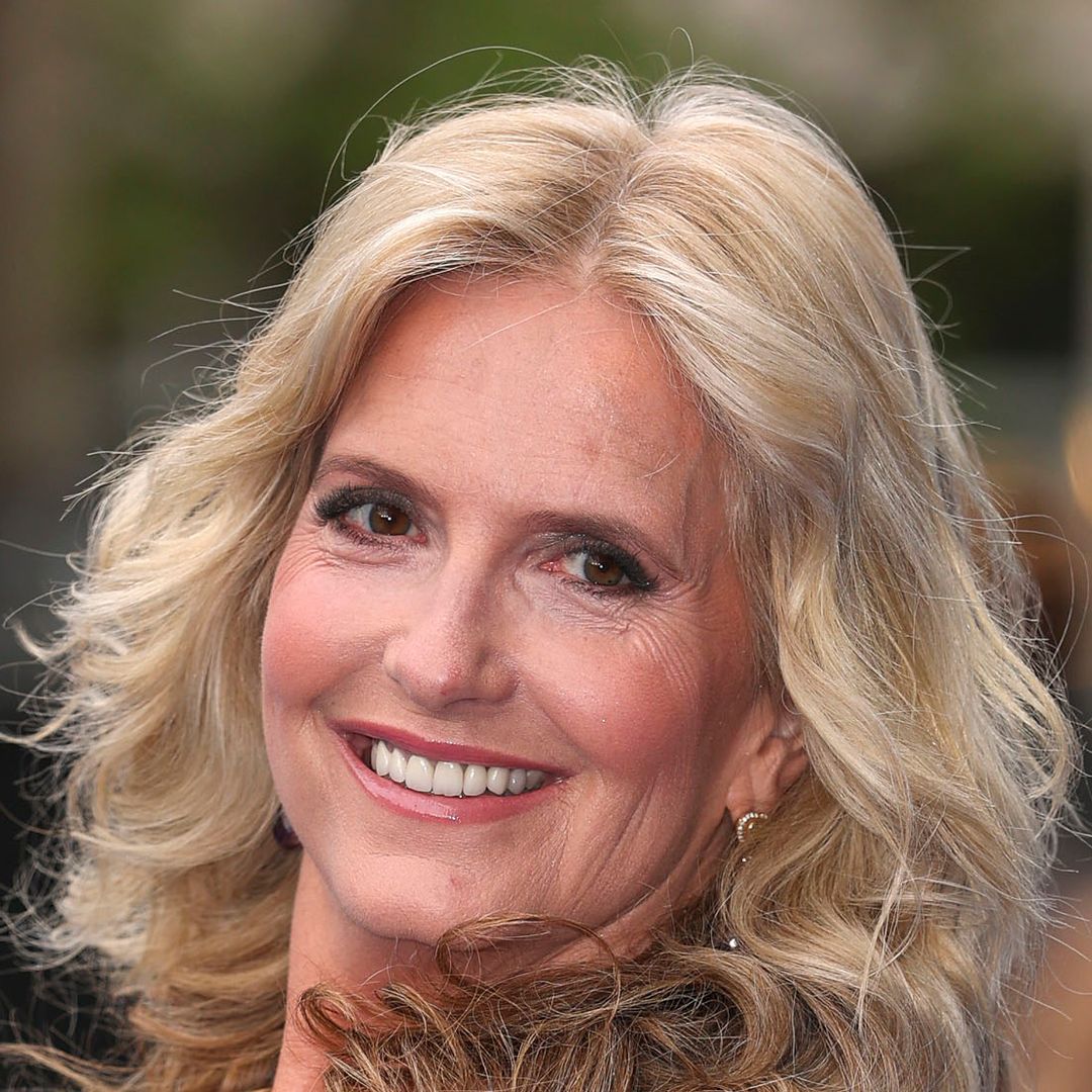 Penny Lancaster shimmers in body-gliding dress alongside towering model son Alastair 