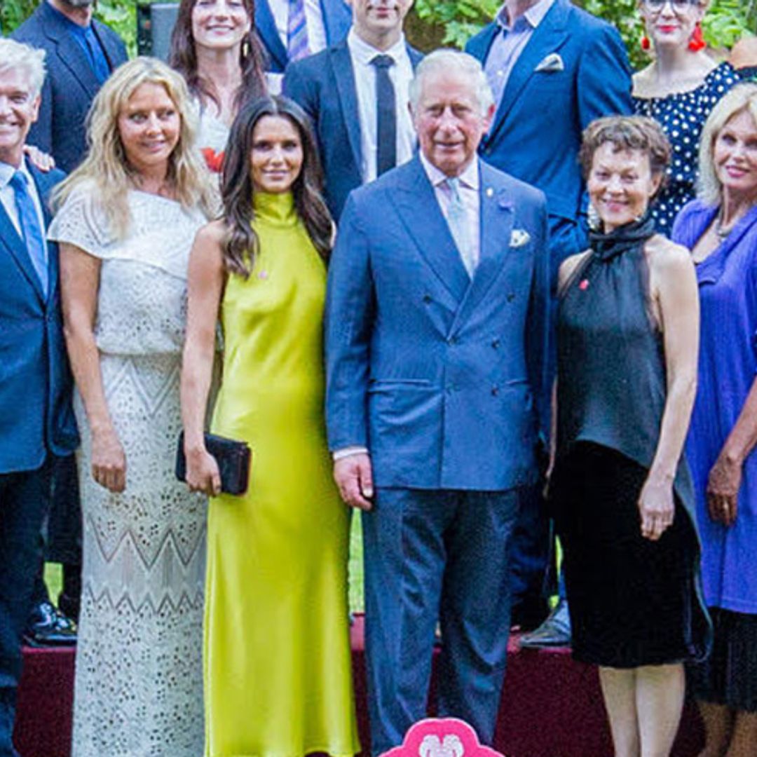 Cheryl turns heads in neon gown as she attends Prince Charles' party