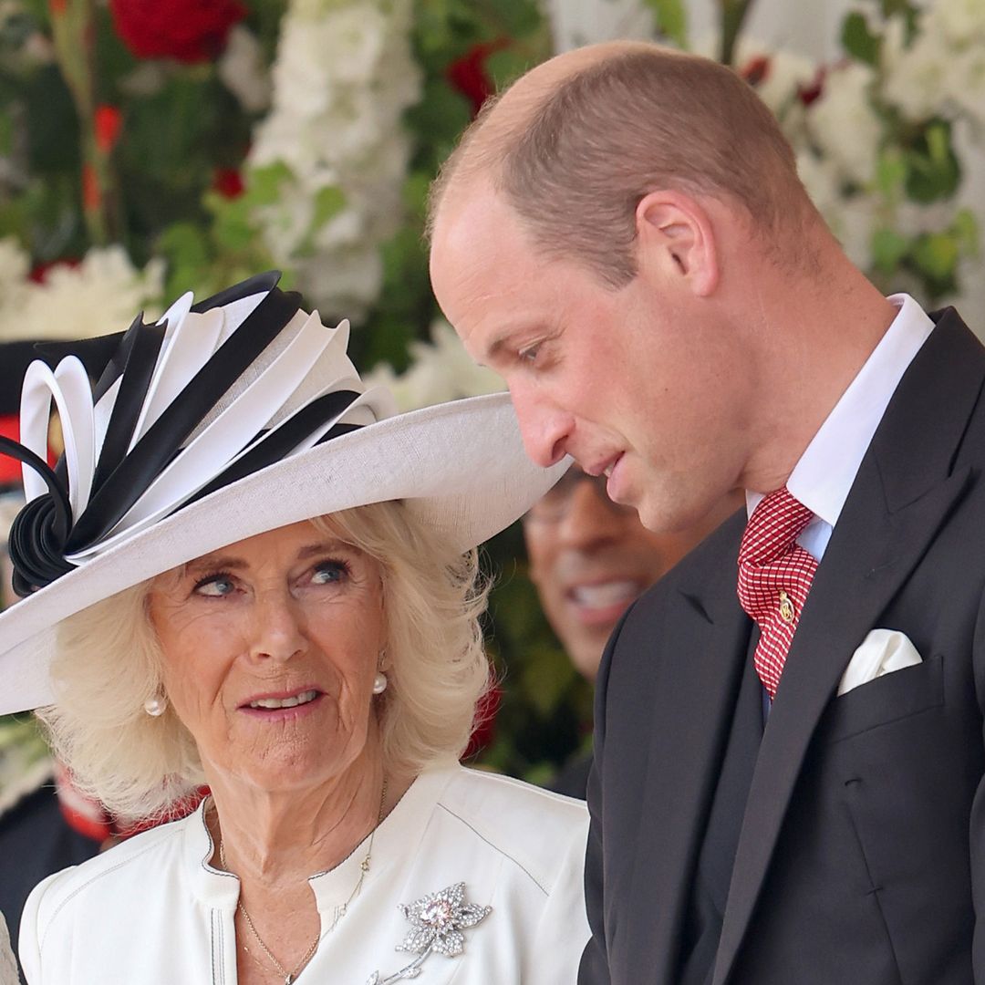 Prince William kisses Queen Camilla in a rare display of affection
