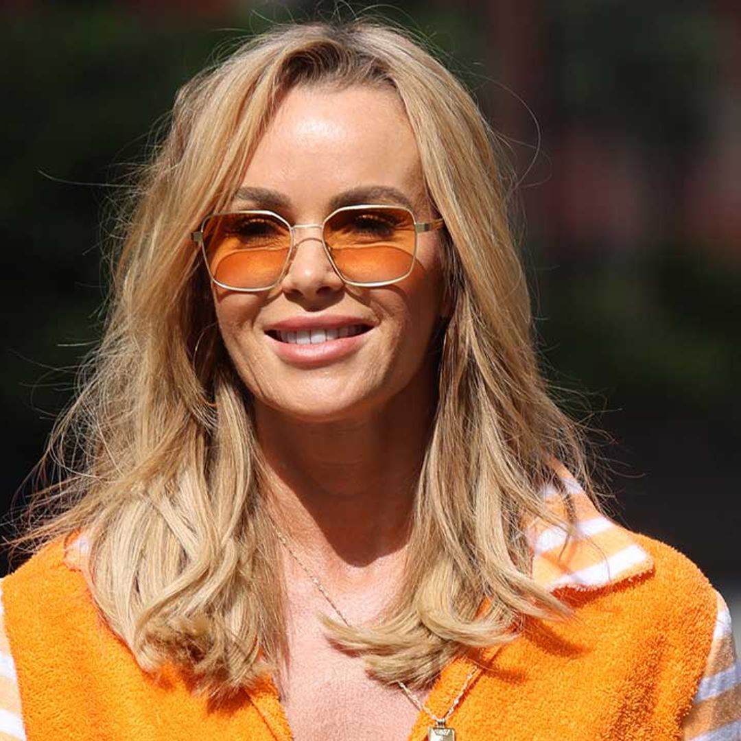 Amanda Holden looks impossibly youthful in crop top and figure-hugging dungarees