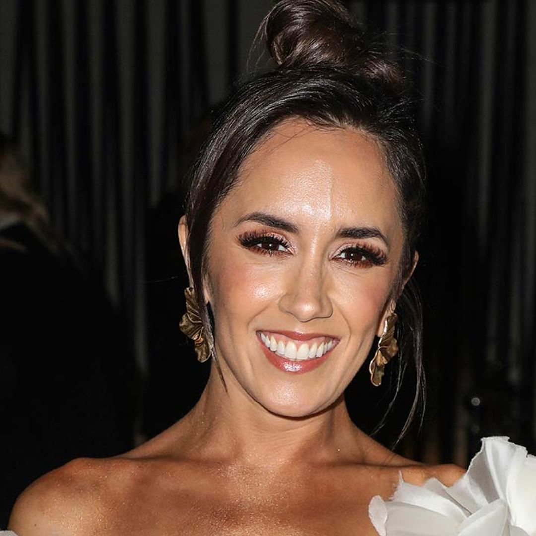 Janette Manrara sizzles in figure-enhancing gold dress for emotional reunion