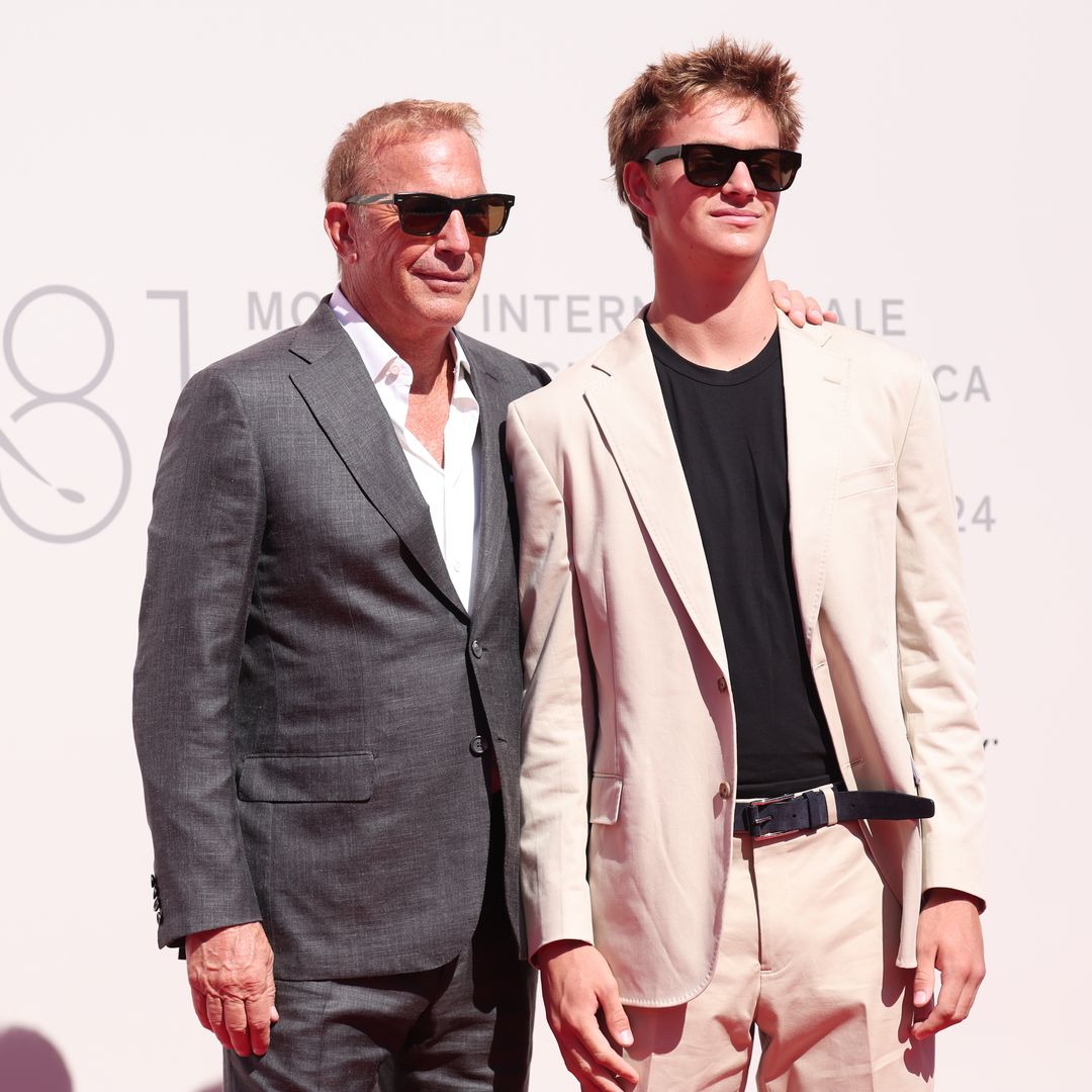 Kevin Costner's teenage son Cayden towers over his father as they attend film premiere