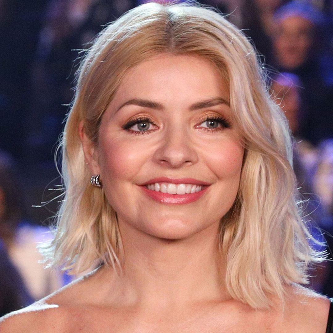 Holly Willoughby teases her glittering dress with a sassy dance - watch