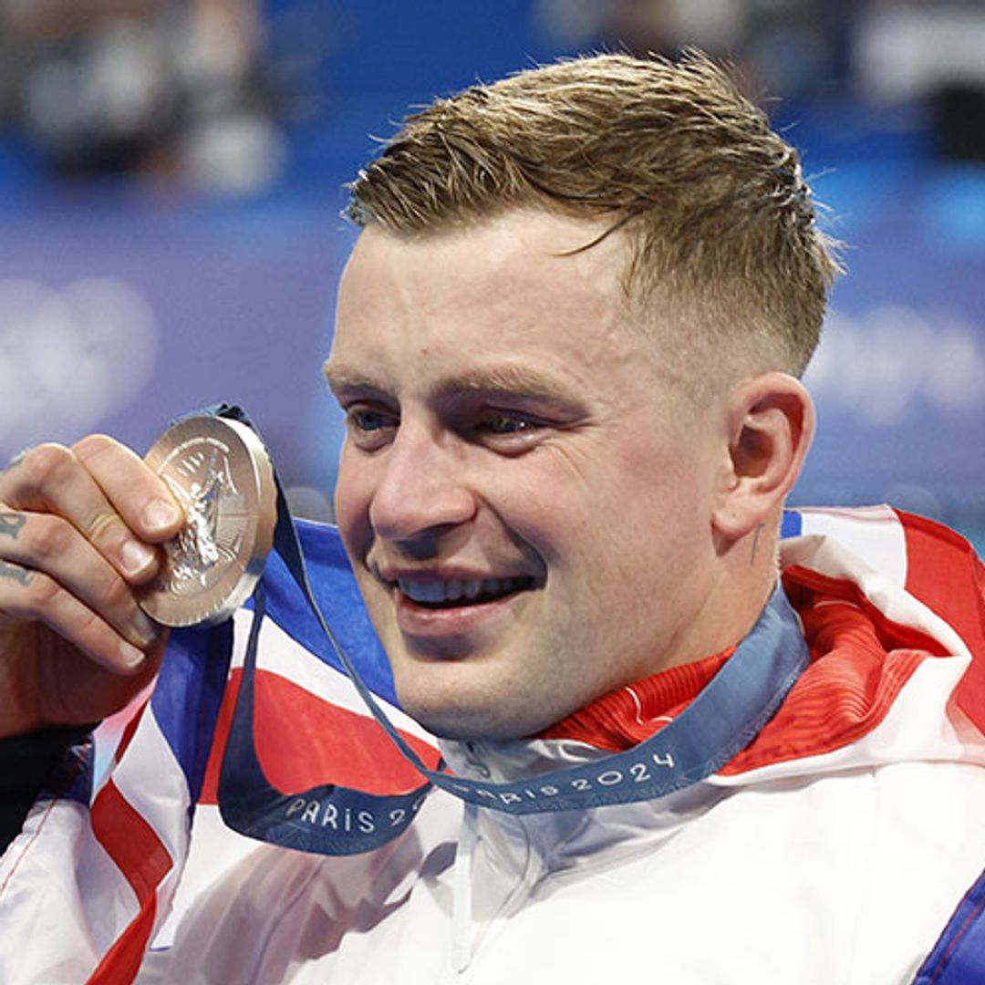 Teary-eyed Adam Peaty shares passionate kiss with girlfriend Holly Ramsay after Olympic success