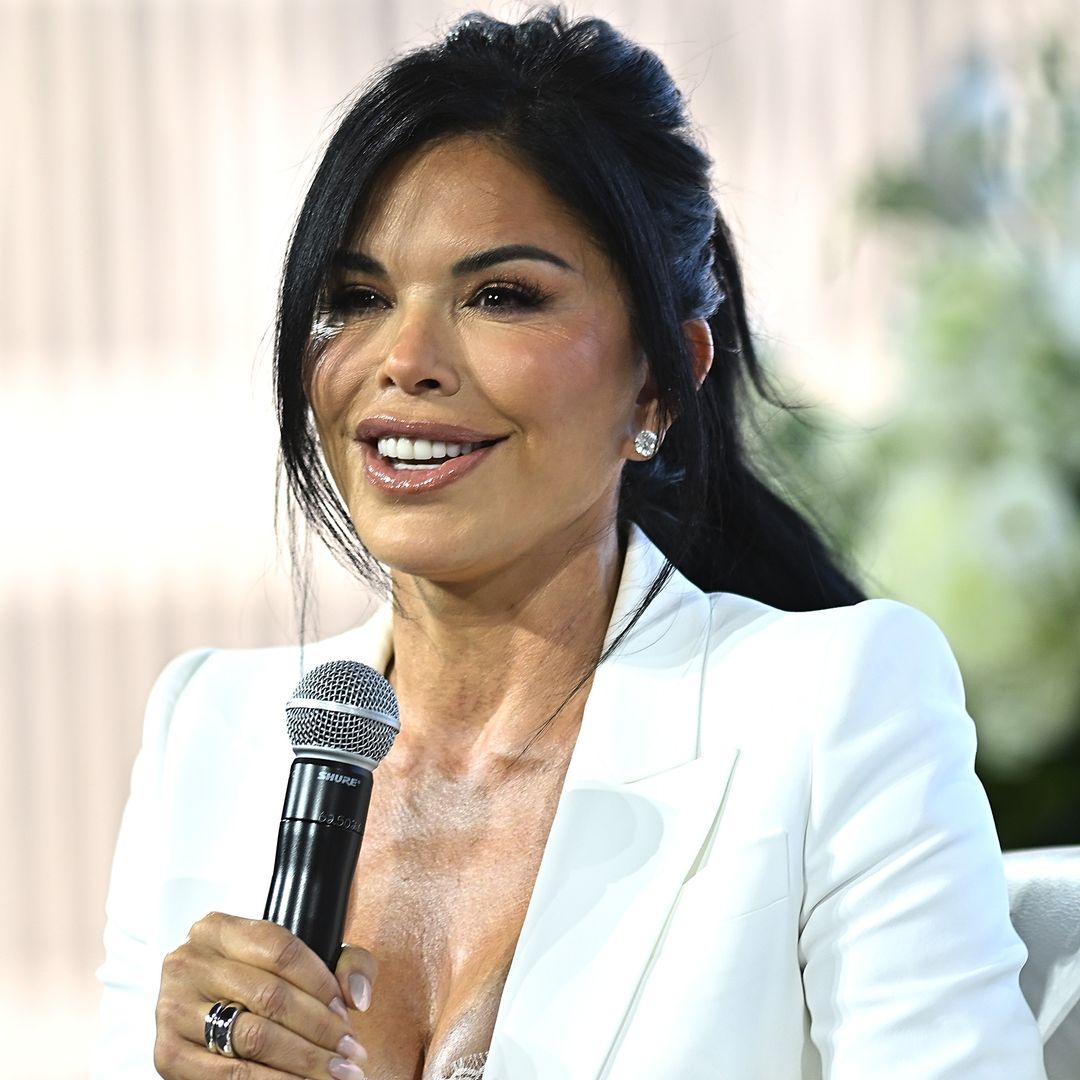 Lauren Sanchez, 54, defends her 'sexy' fashion style as she rocks white power suit