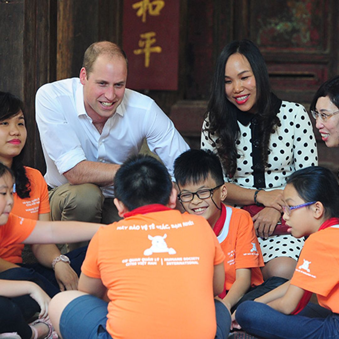 Prince William bonds with local children on day one of Vietnam visit