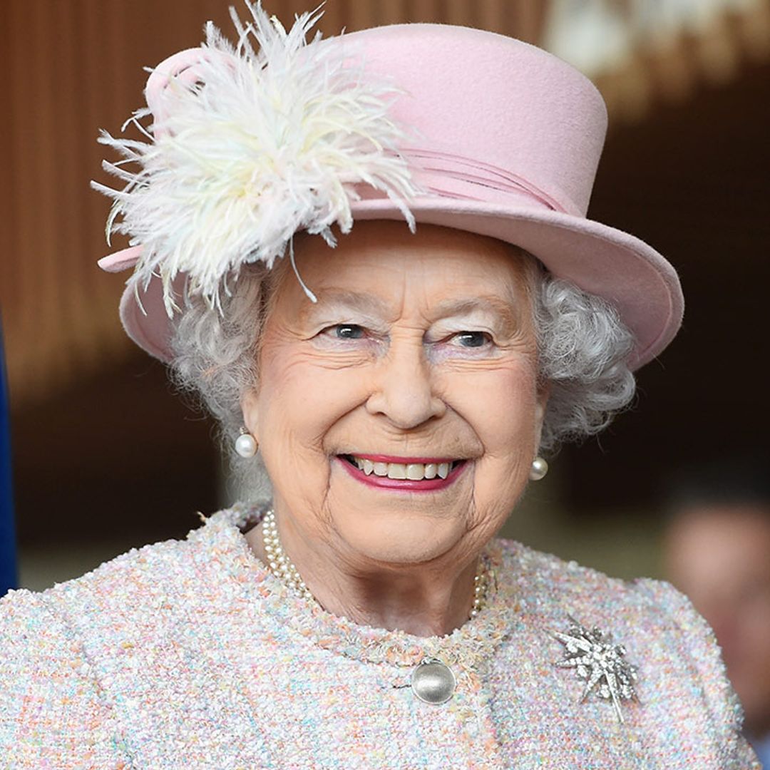 The Queen pictured wearing a hearing aid for the first time