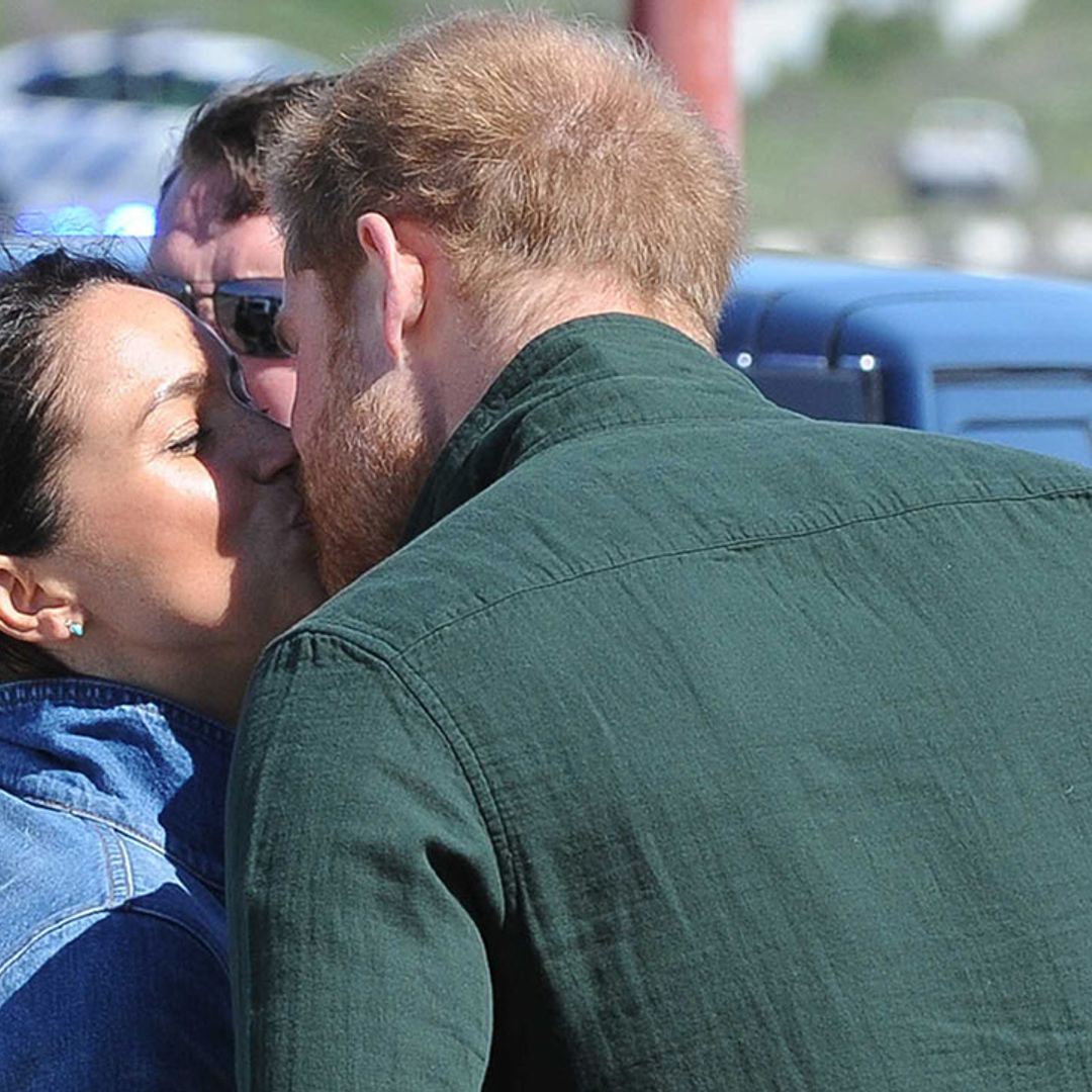 Prince Harry and Meghan Markle share sweet kiss and open up about parenting - see the best photos