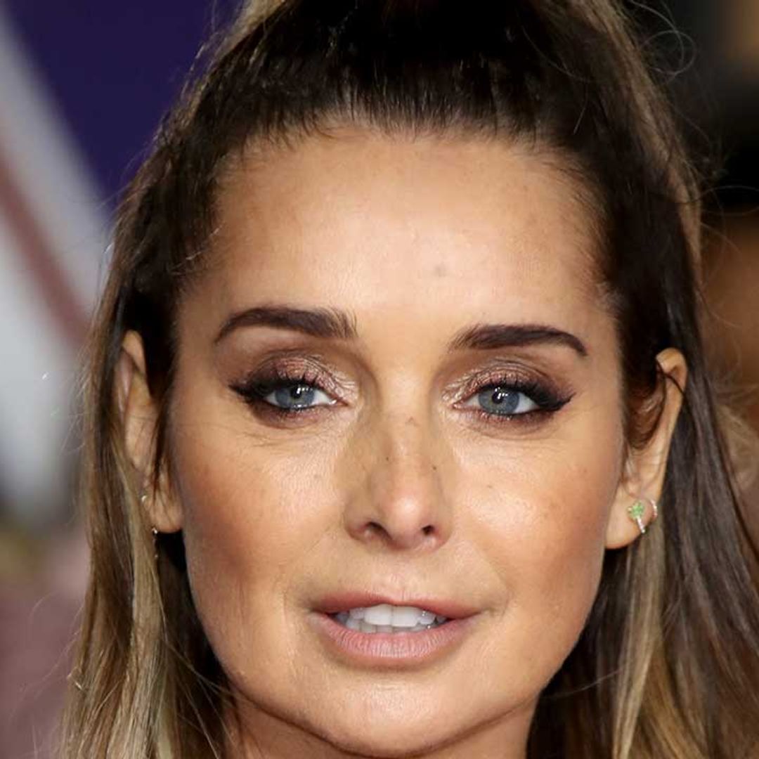 Louise Redknapp commands attention in daring leather look and knee-high boots