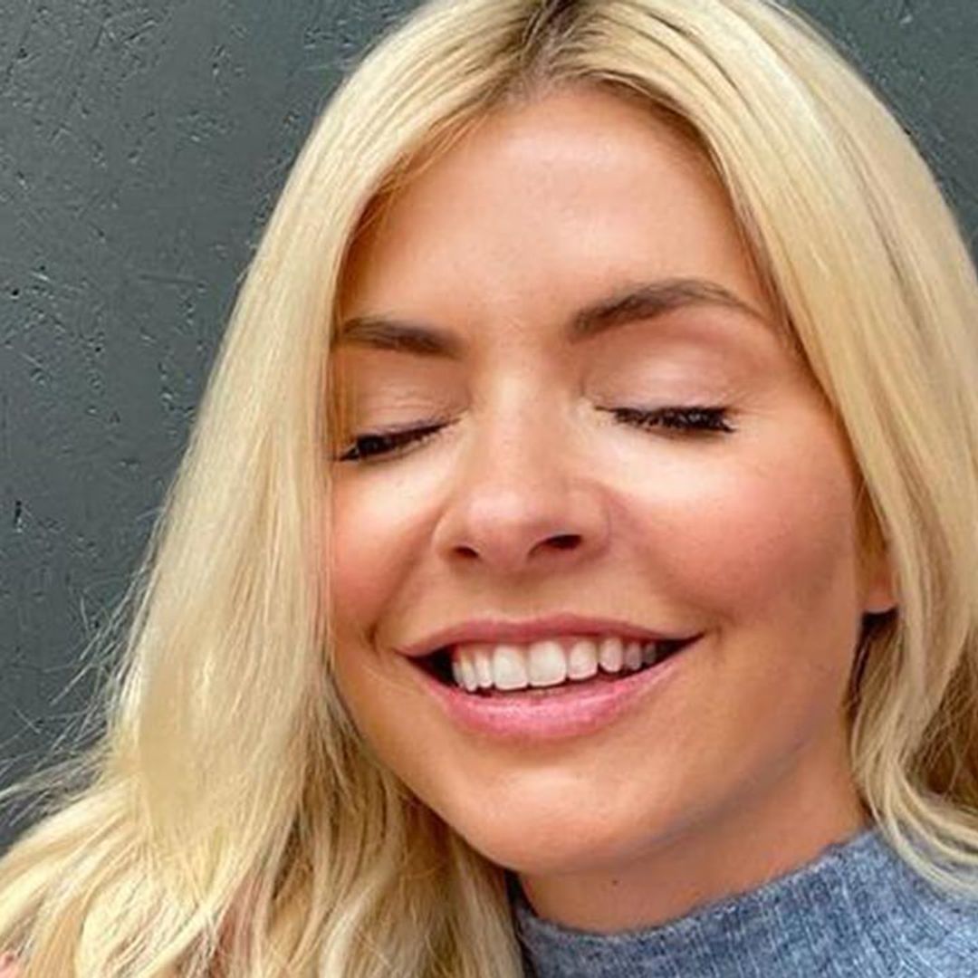 Holly Willoughby is a vision in super flattering skirt and silky blouse