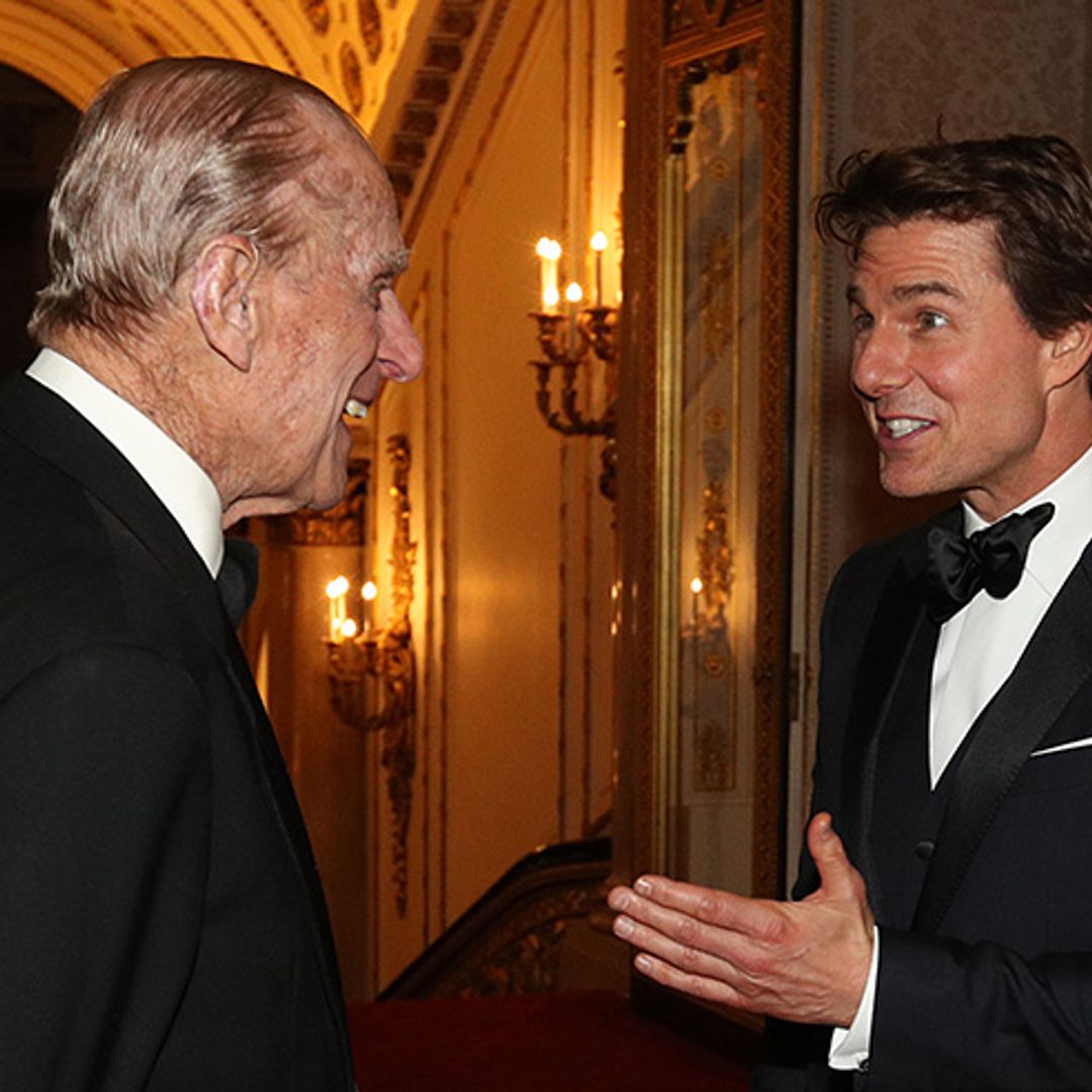 Tom Cruise shares a laugh with Prince Philip at Buckingham Palace dinner