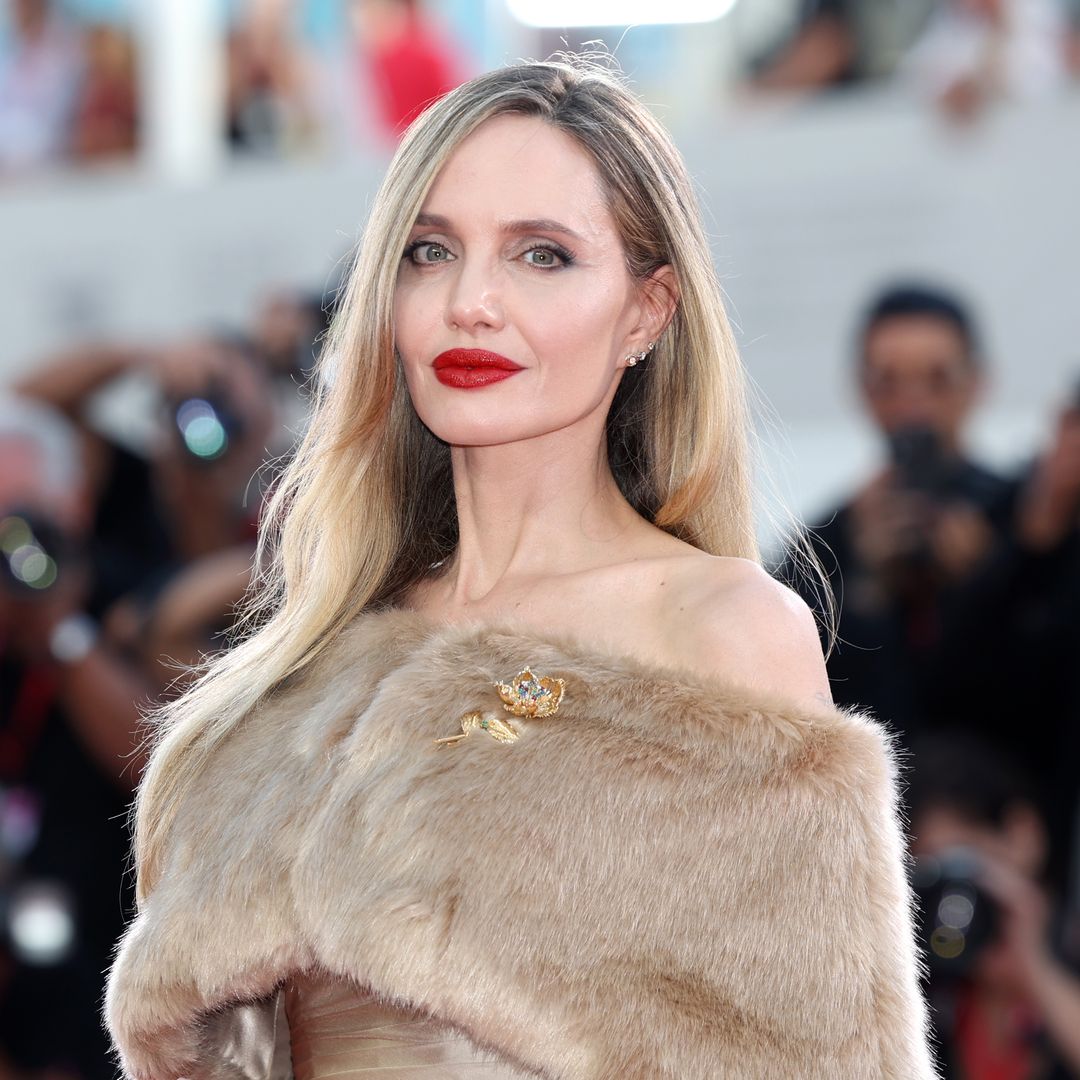 Angelina Jolie’s plunging backless sequinned gown is pure party perfection