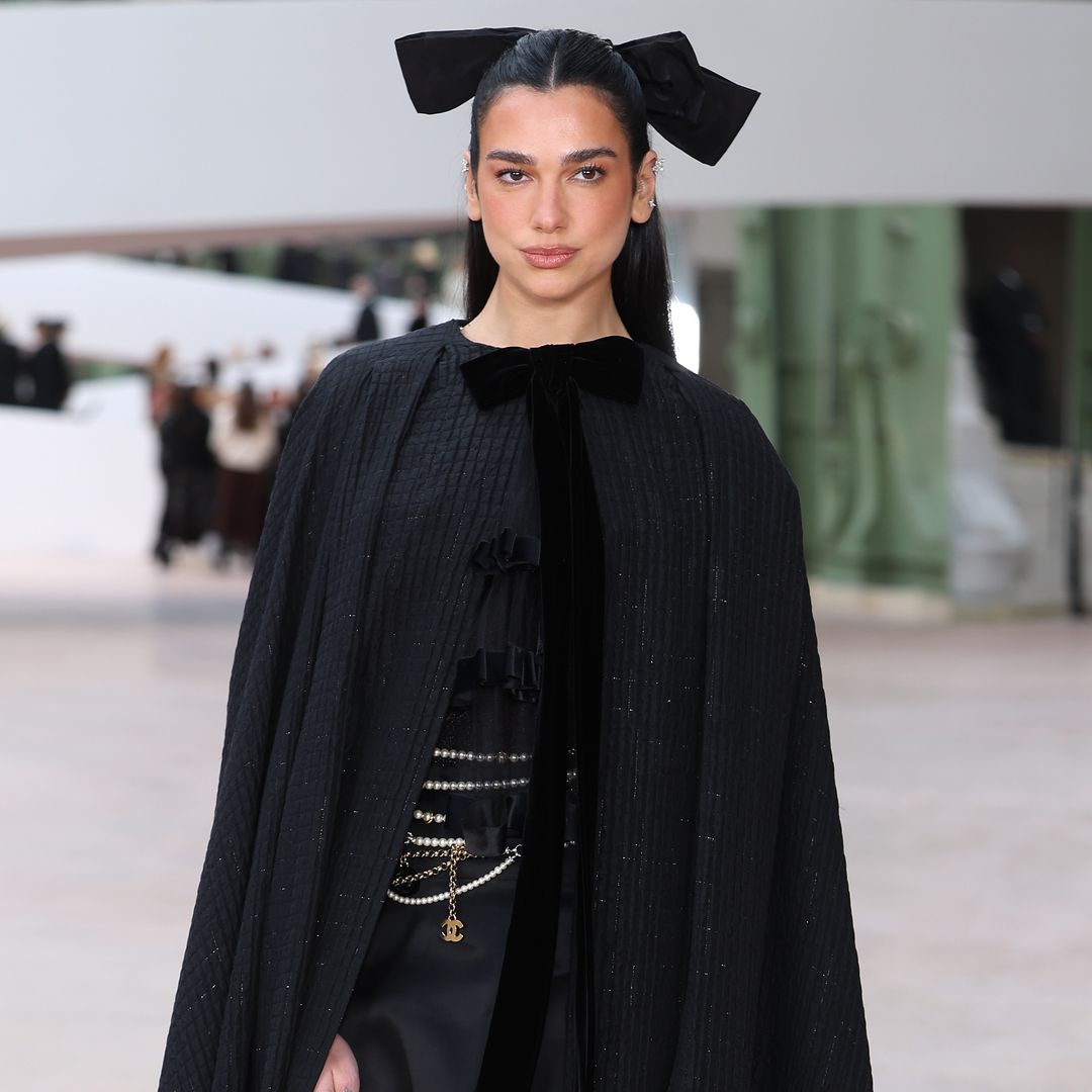 Dua Lipa dazzles in operatic cape at Chanel Haute Couture show