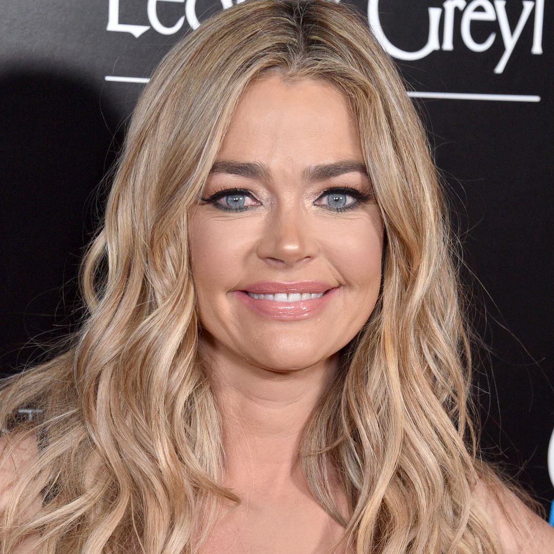 Denise Richards wows in figure-hugging bodycon dress  - and wait until you see her hair