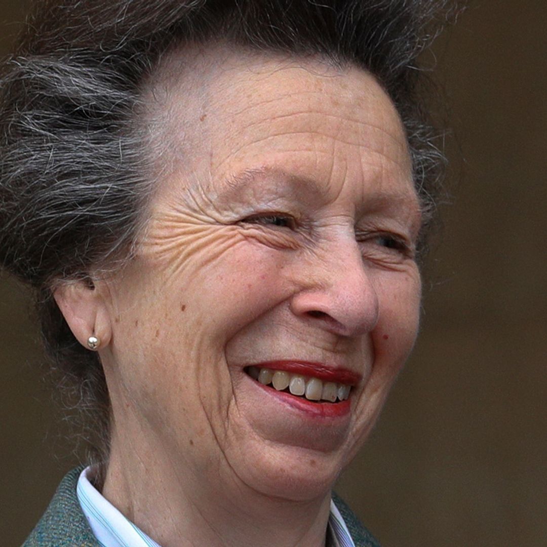 Princess Anne surprises in knee-high suede boots and chic coat