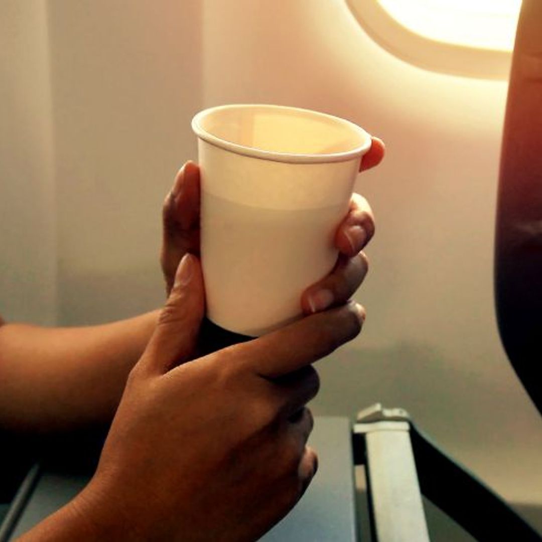 This is why you should NEVER drink tea or coffee on a plane