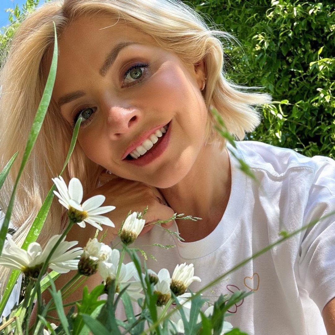 Holly Willoughby is a sun-kissed vision in gorgeous summer dress – and her hair!