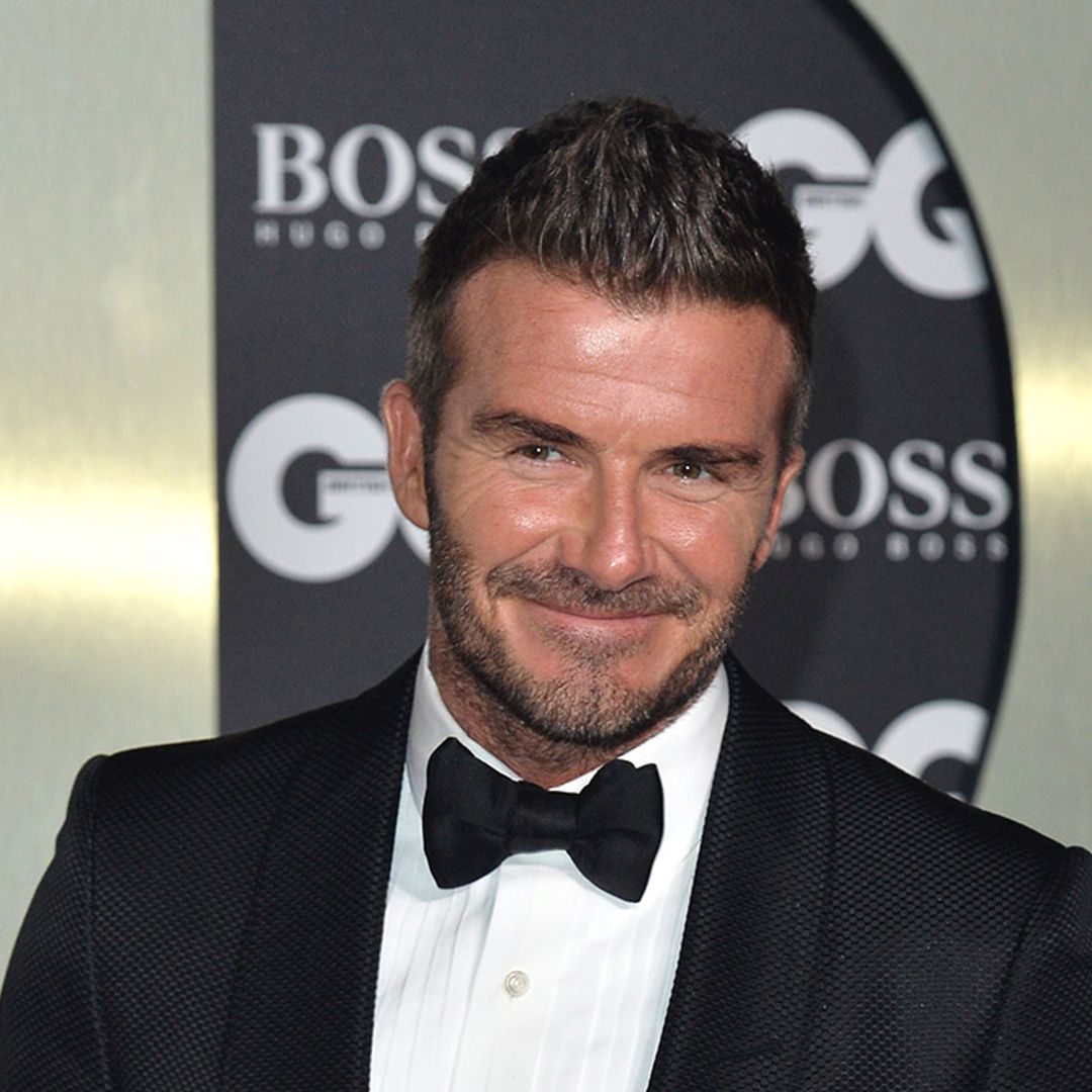 David Beckham freaks out after his idol gives him a cuddle