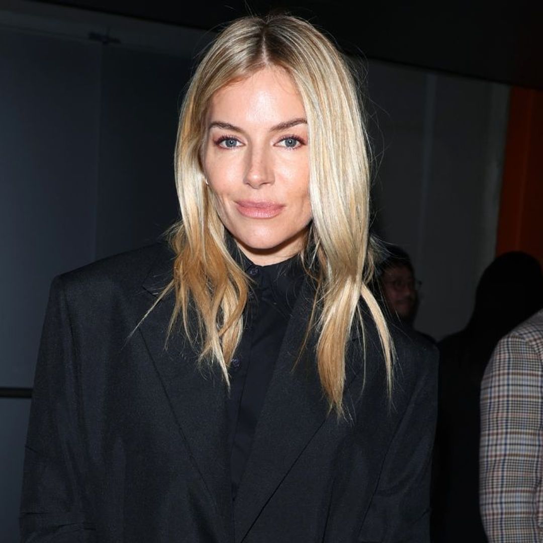 Sienna Miller wears 2023's most unconventional shoes at Prada AW23 show