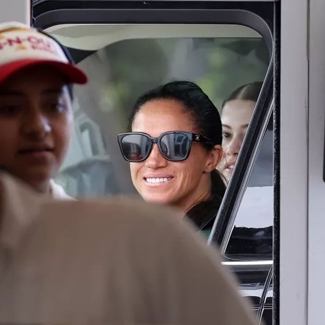 Meghan Markle is all smiles as she grabs In-N-Out Burger at the Santa Barbara drive-thru