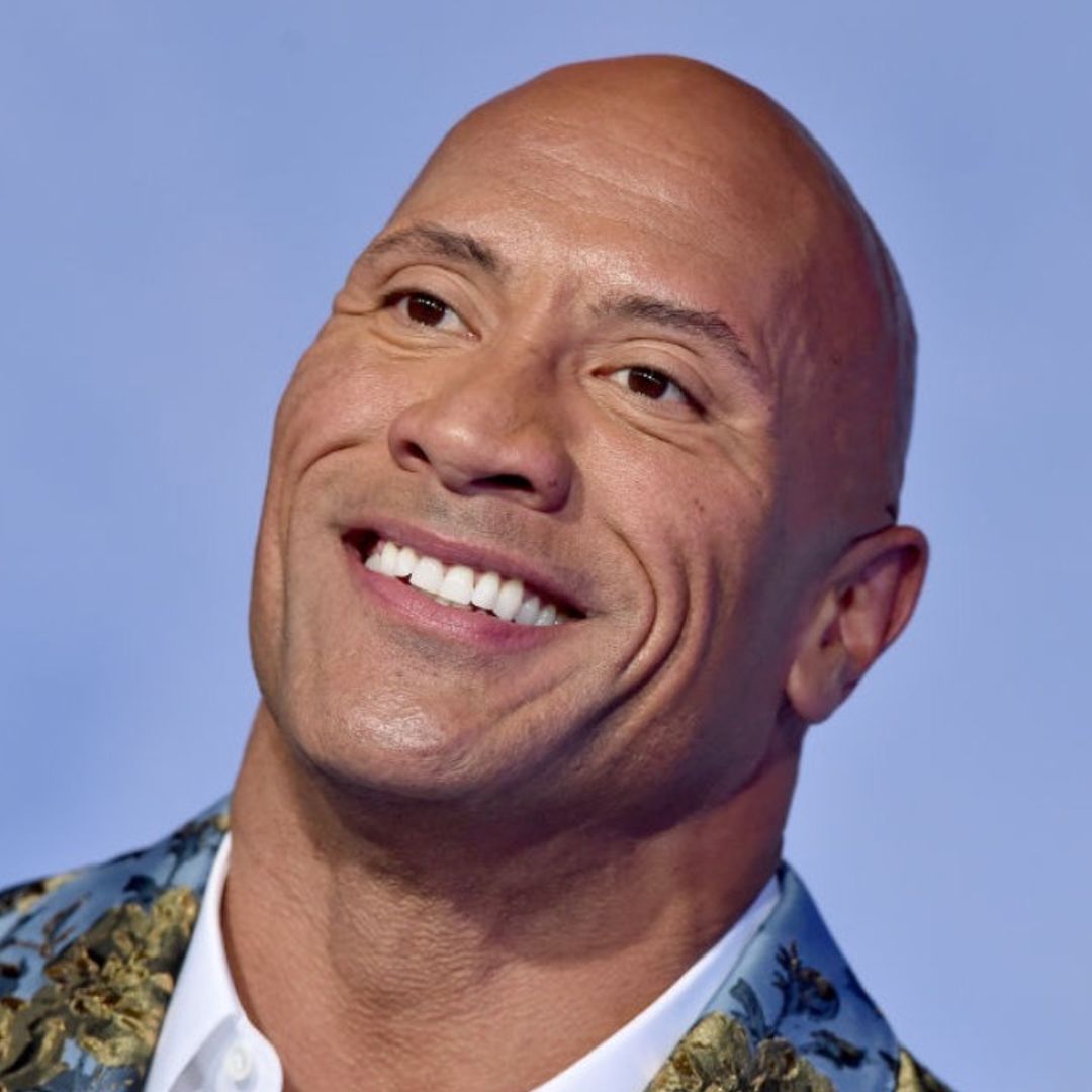 The Rock can't believe how much this police officer looks like him – and you won't, either