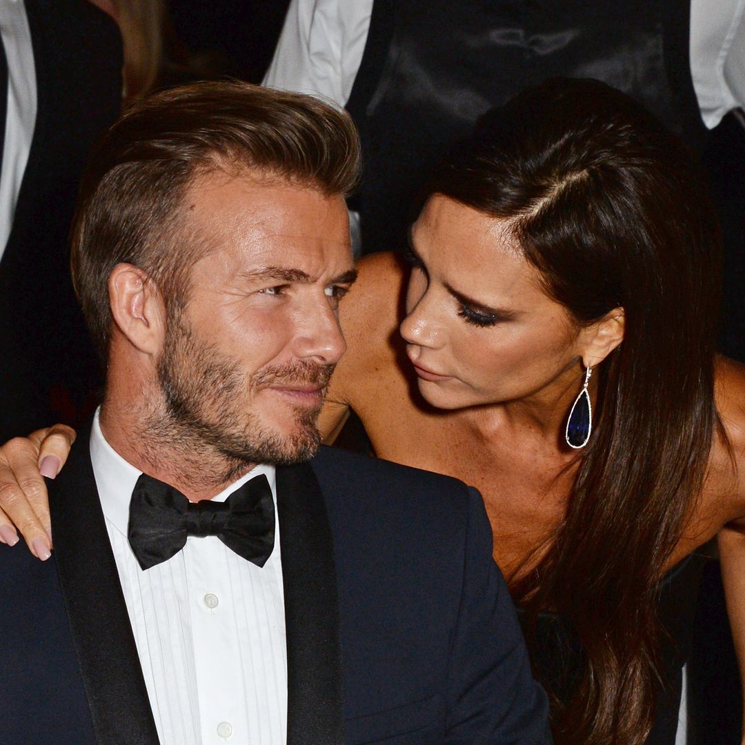Victoria Beckham shows off her rarely-seen smile as she hits the dance floor with David