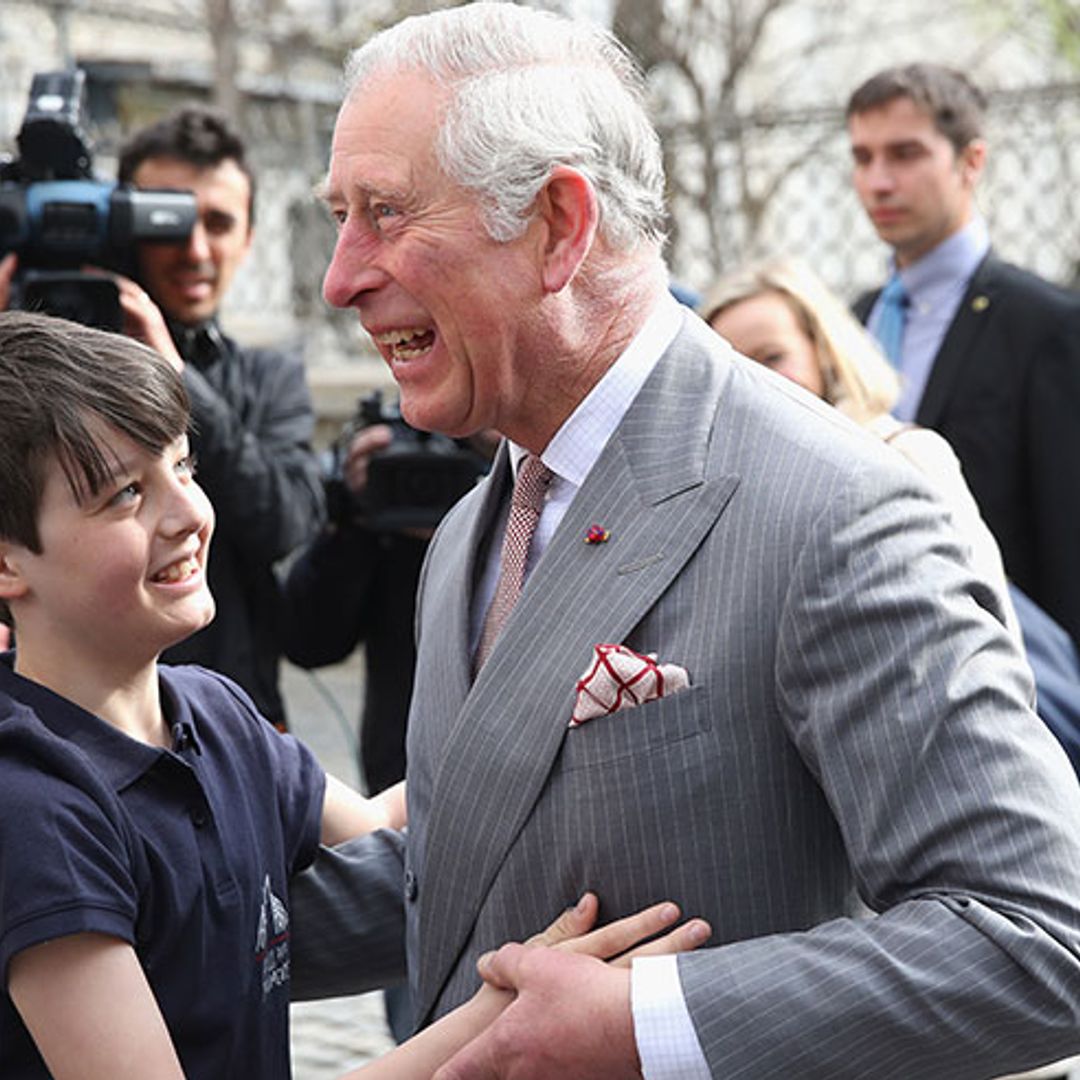 Revealed: Touching story behind Prince Charles' affectionate hug with schoolboy