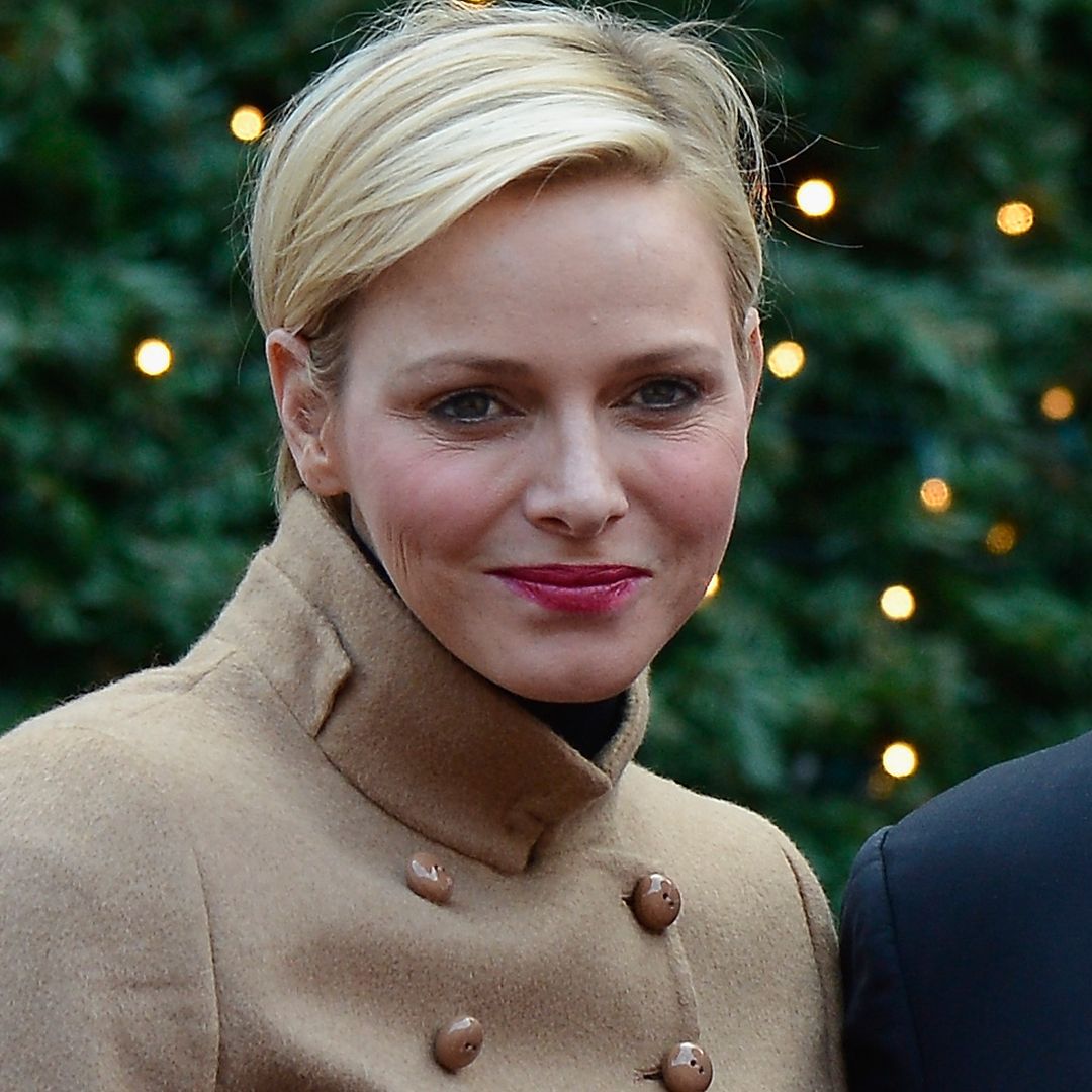 Princess Charlene and daughter Princess Gabriella, 9, twin in knee-high boots