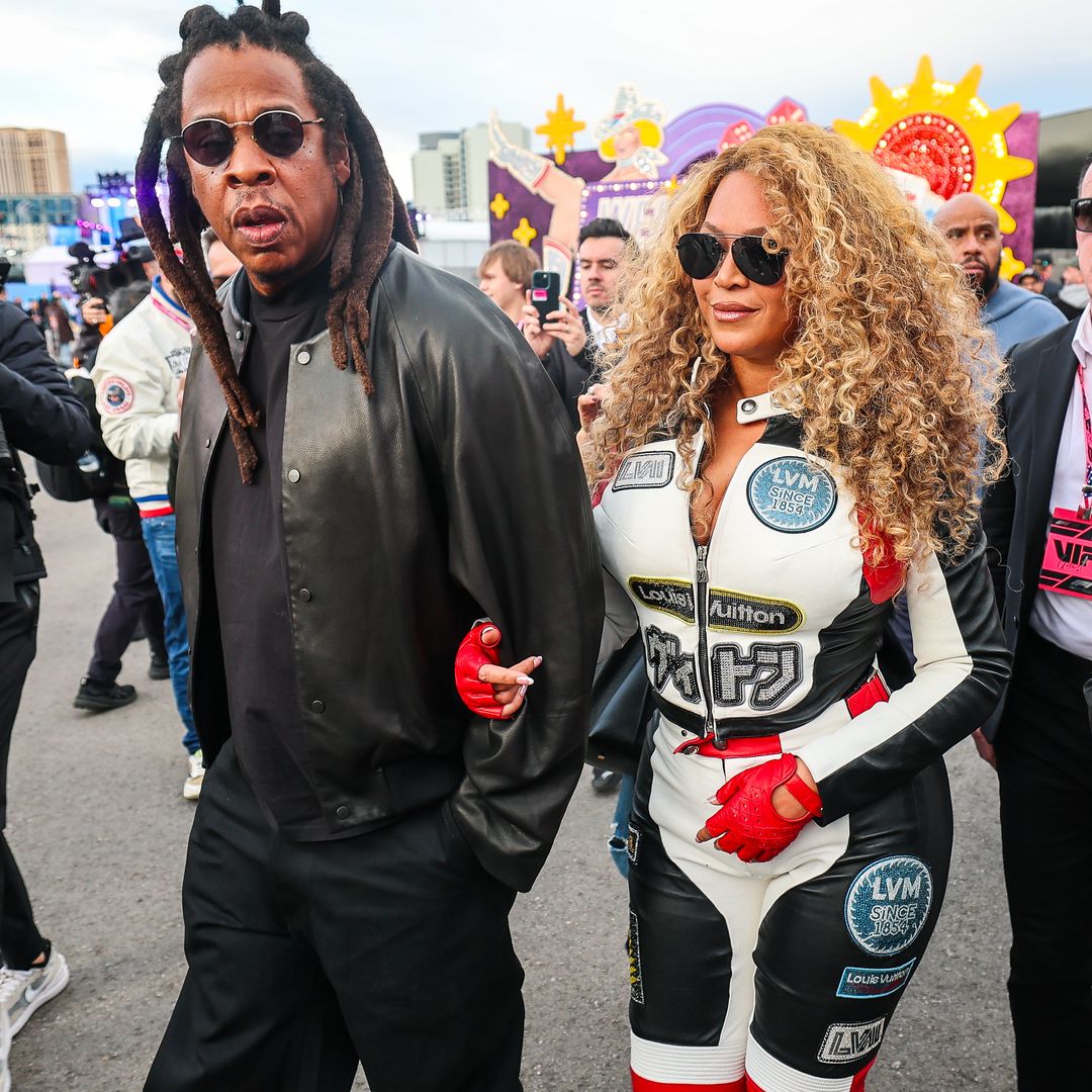 Jay-Z and Beyonce walk in the paddock during the F1 Grand Prix of Las Vegas at Las Vegas Strip Circuit