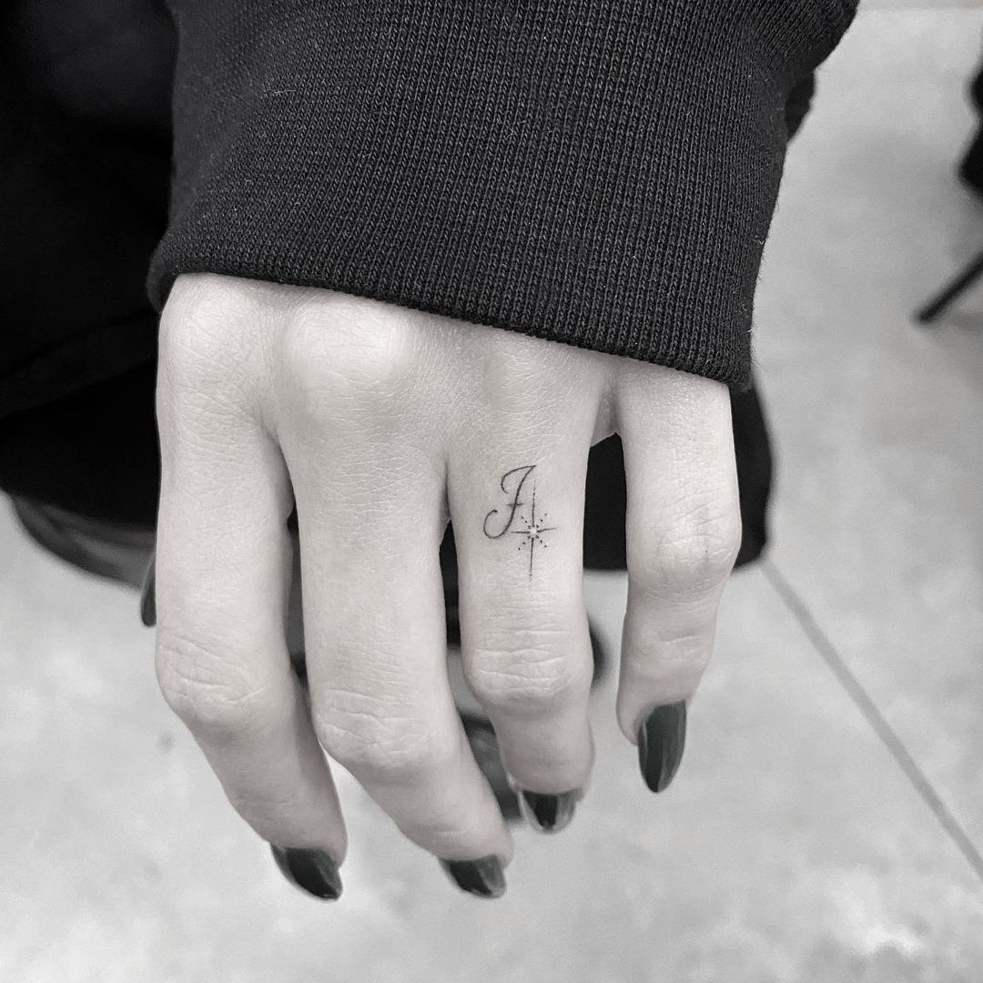 Hailey Bieber's 'J' tattoo on her finger 